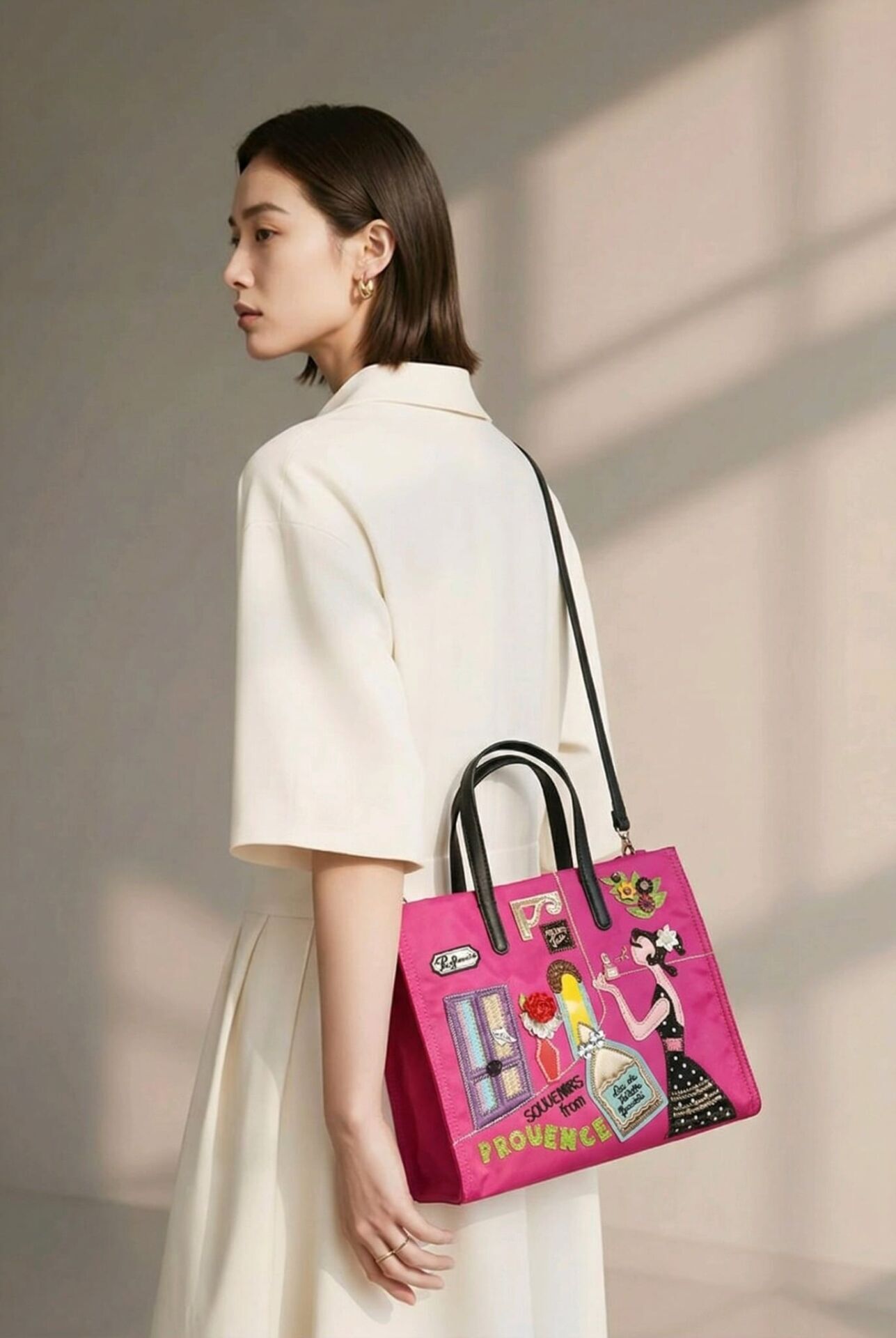 PEMBE NAKIŞLI VE ÇOK RENKLİ PARAŞÜT KUMAŞ ÇANTA