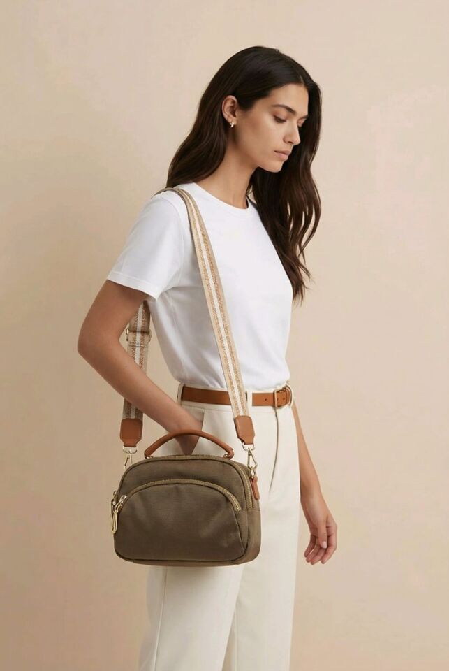 ÇOK BÖLMELİ ZEYTİN YEŞİLİ/ HAKİ TONLARINDA KUMAŞ EL VE KOL ÇANTASI